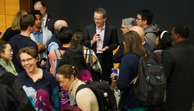 group surrounds Intel CEO Pat Gelsinger