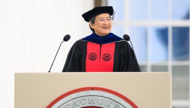 Lisa Su standing in front of podium 