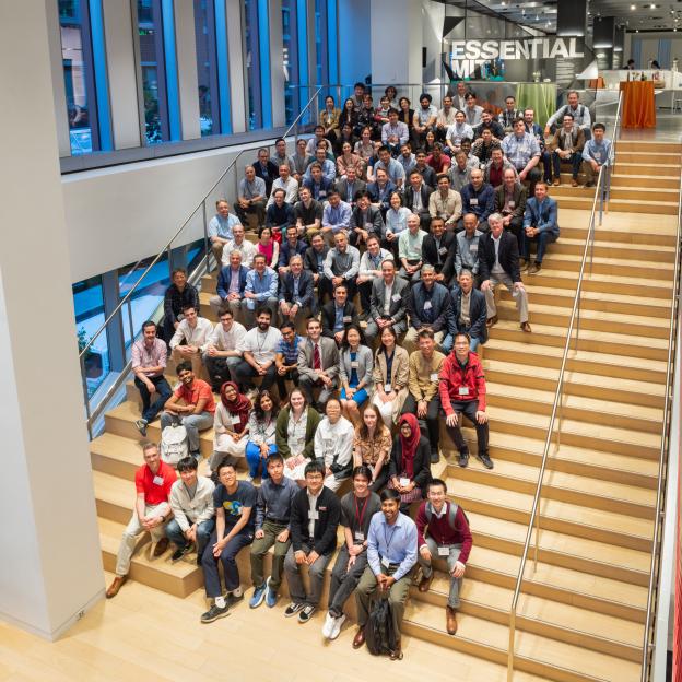 group of people sitting on stairs