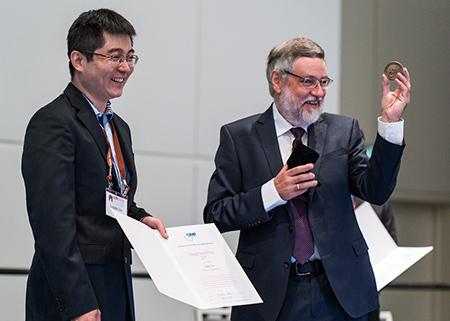 Prof. Luqiao Liu and Prof. Dr. Burkard Hillebrands from University of Kaiserslautern, Germany, the chair of IUPAP Commission on Magnetism