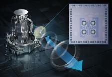 This image shows a transceiver chip the researchers developed that is placed inside a complex refrigerator that houses a quantum computer.