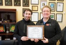Alex Kachkine and Luis Fernando Velásquez-García pose with their award.