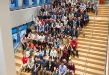 group of people sitting on stairs