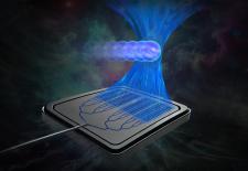 chip-based "tractor-beam," which uses an intensely focused beam of light to capture and manipulate biological particles without damaging the cells