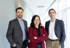 2 men and 1 woman standing together