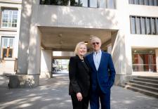 Christine and L. Rafael Reif stand at entrance to the newly named L. Rafael Reif Innovation Corridor
