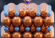 stacked blue and gold balls with a smaller ball on the top
