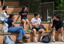students sitting on steps