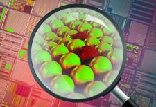 magnify glass looking at green and red balls