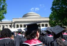 graduates in front of the dome 