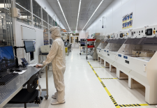 person standing at kiosk in lab